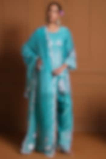 Teal Silk Floral Thread Work Kurta Set by Sonia Khatri at Pernia's Pop Up Shop