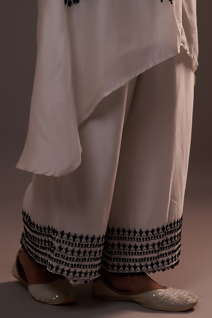 White Summer Silk Sequins Hand & Machine Embroidered Kurta Set by Sonia Khatri at Pernia's Pop Up Shop