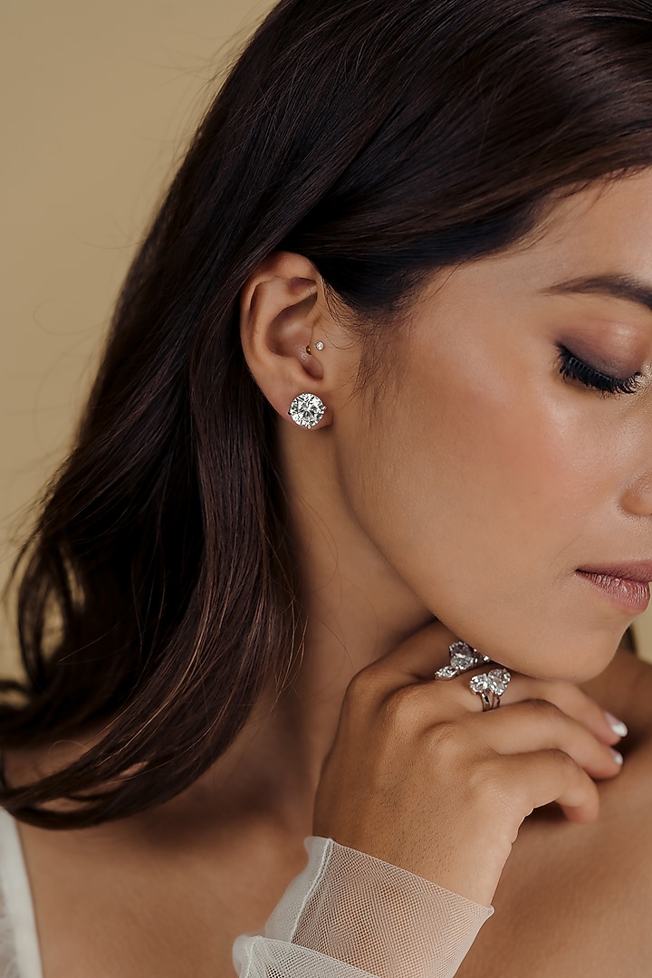 White Finish Swarovski Stud Earrings In Sterling Silver by Solasta Jewellery at Pernia's Pop Up Shop