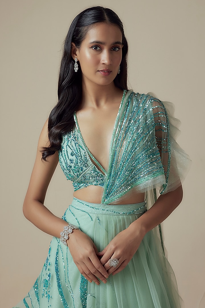 Green Net Sequins Embroidered Draped Bridal Lehenga Set by Sulakshana Monga at Pernia's Pop Up Shop