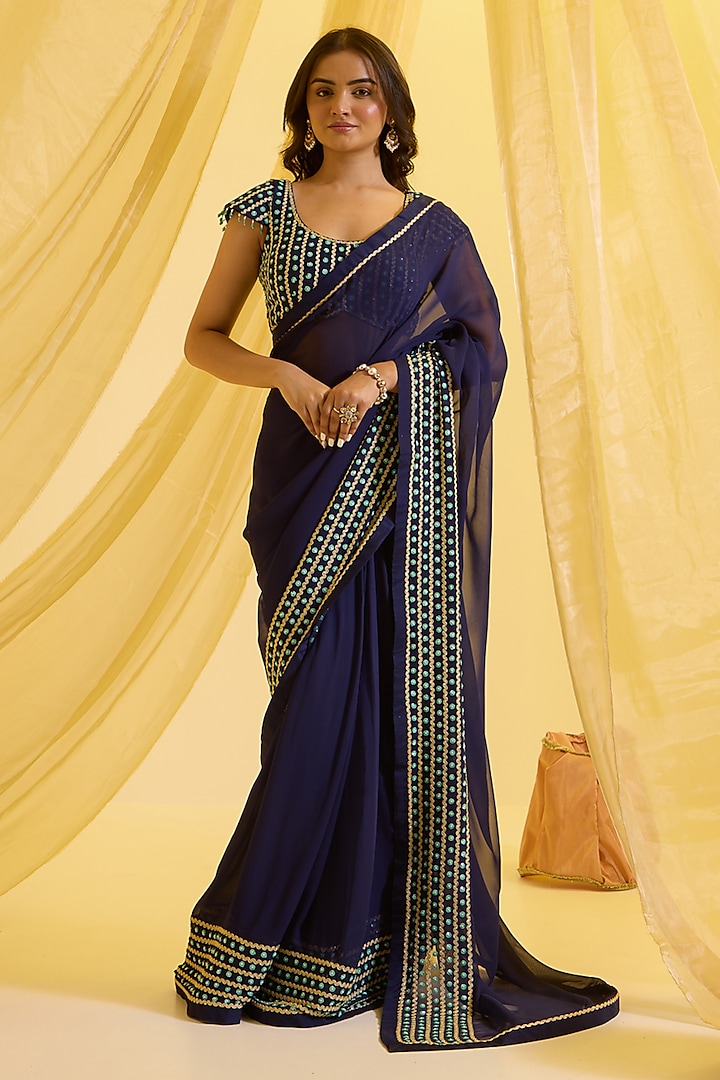 Dusky Blue Raw Silk & Georgette Embellished Draped Saree main image 1