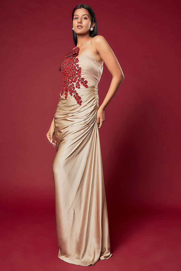 Champagne Satin Georgette Embroidered Draped Gown by Sonaakshi Raaj