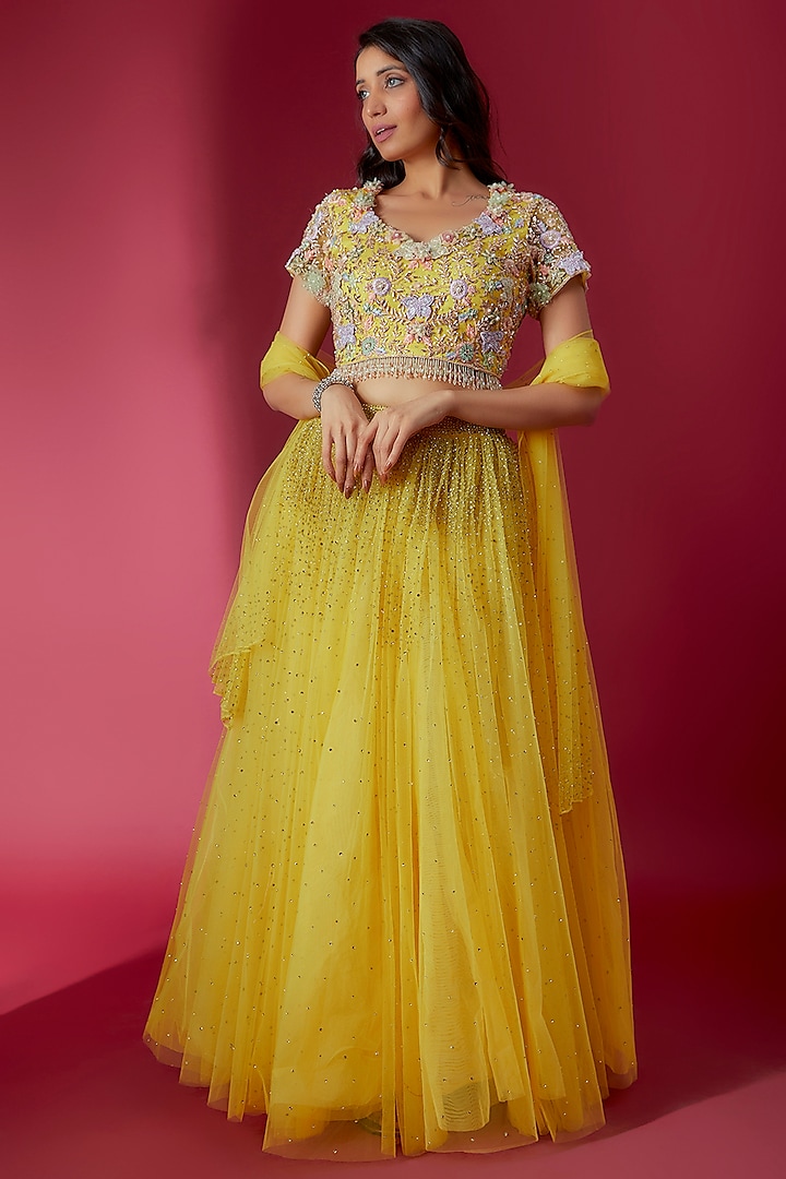 Yellow Swiss Net & Cotton Satin Embroidered Lehenga Set by Sonaakshi Raaj