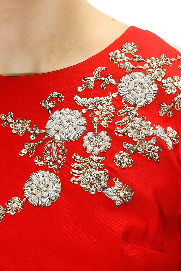 Red floral pearl and dabka embroidered peplum blouse available only at Pernia's Pop Up Shop.