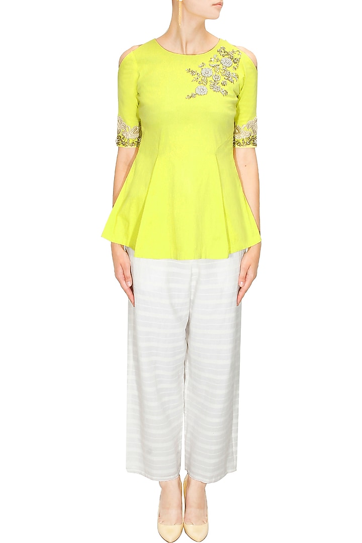 Yellow floral pearl and dabka embroidered peplum blouse available only at Pernia's Pop Up Shop.