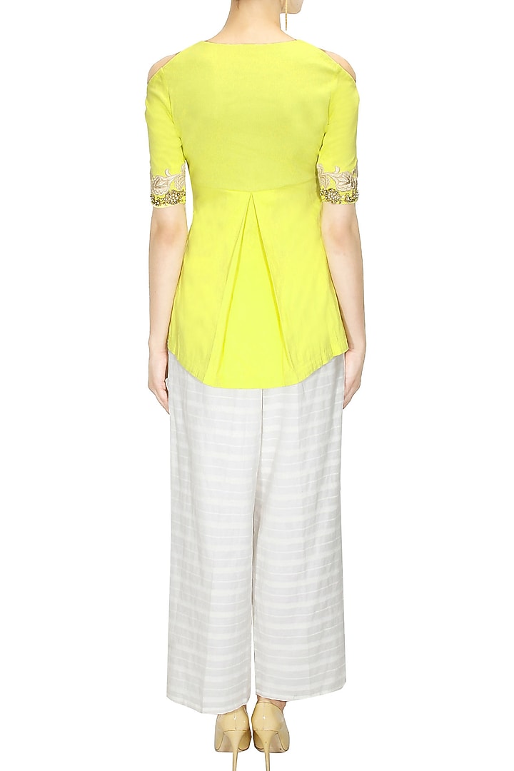 Yellow floral pearl and dabka embroidered peplum blouse available only at Pernia's Pop Up Shop.