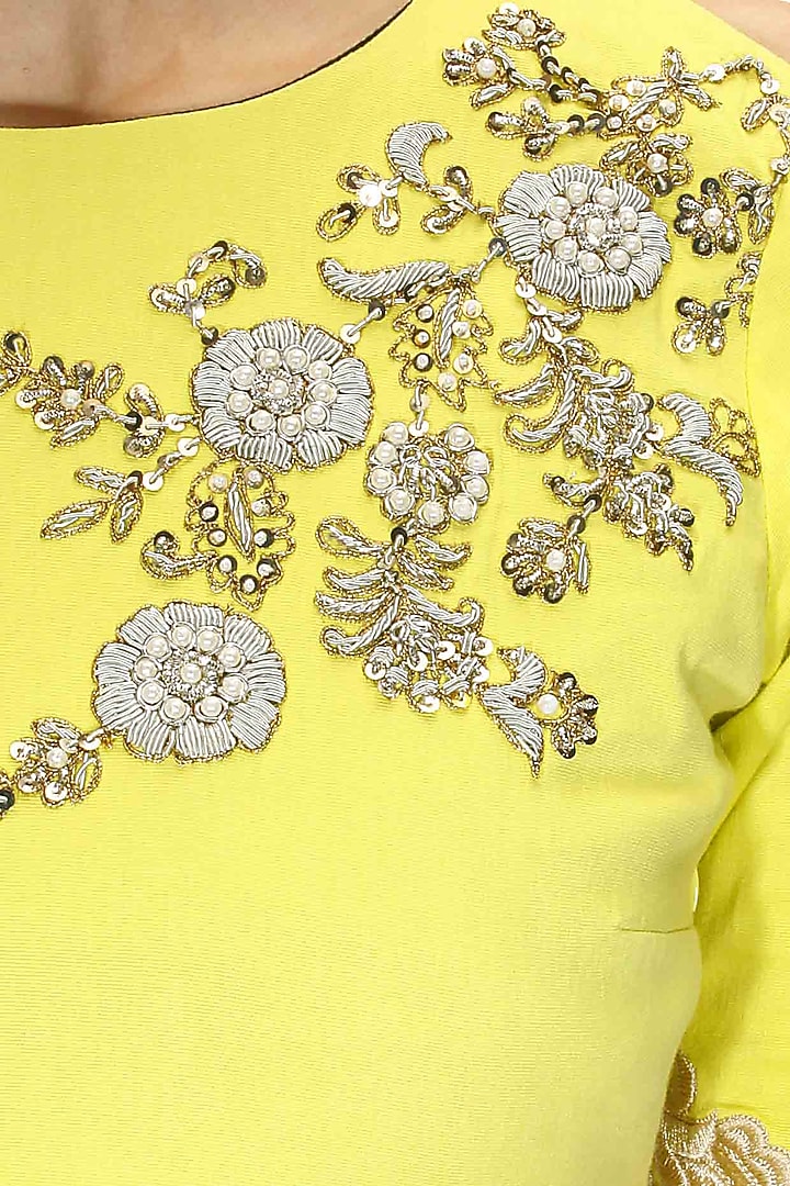 Yellow floral pearl and dabka embroidered peplum blouse available only at Pernia's Pop Up Shop.