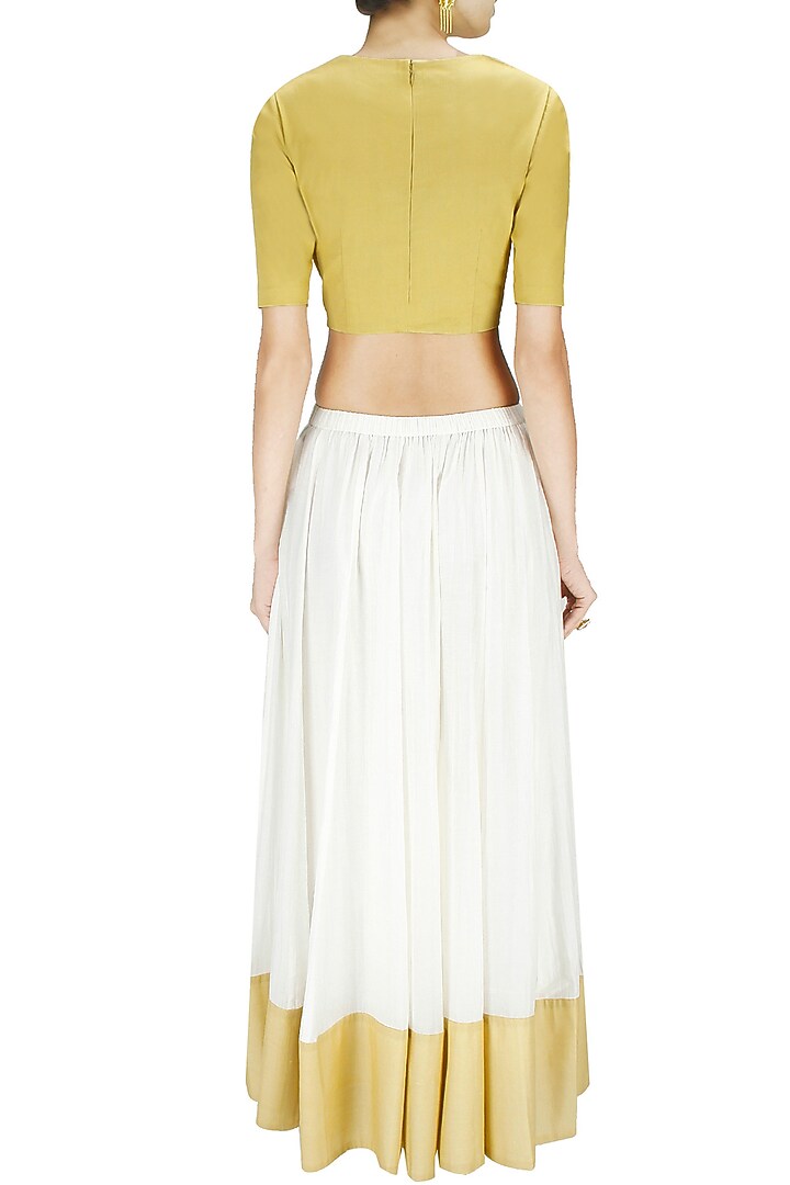 Gold and off white dabka embroidered lehenga set available only at Pernia's Pop-Up Shop.