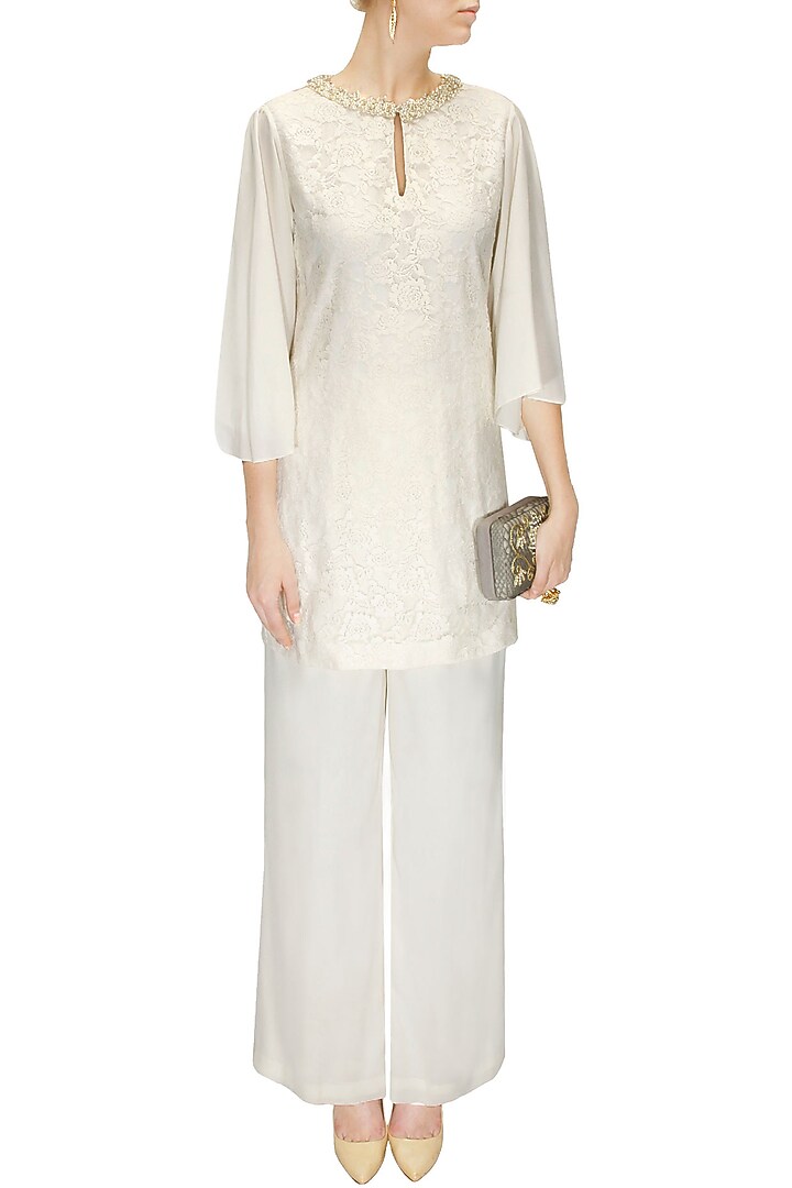 Off white pearl embellished tunic and palazzos available only at Pernia's Pop-Up Shop.