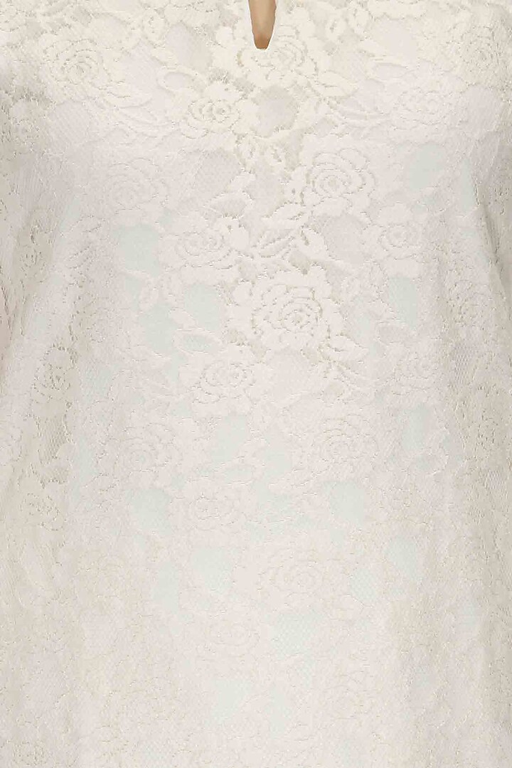 Off white pearl embellished tunic and palazzos available only at Pernia's Pop-Up Shop.