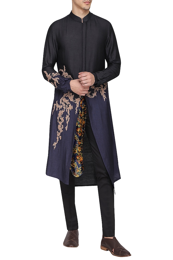 Black asymmetrical embroidered kurta with churidar pants available only at Pernia's Pop Up Shop.