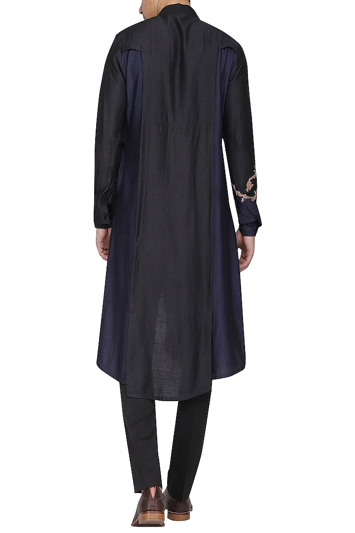 Black asymmetrical embroidered kurta with churidar pants available only at Pernia's Pop Up Shop.