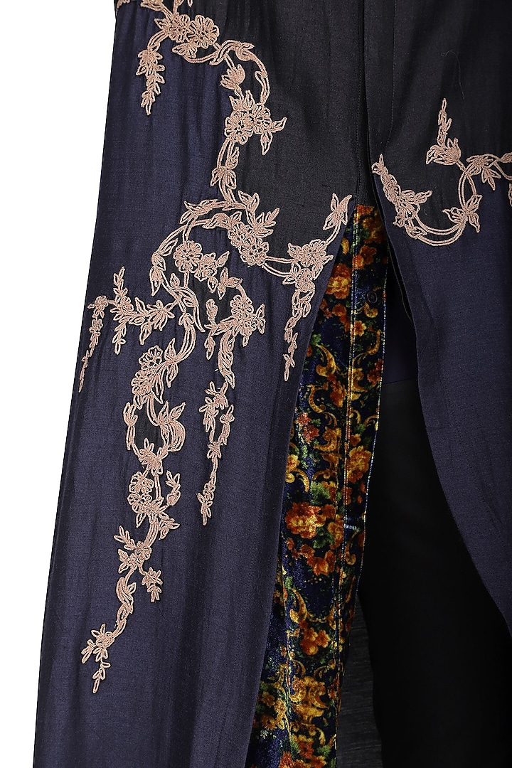 Black asymmetrical embroidered kurta with churidar pants available only at Pernia's Pop Up Shop.