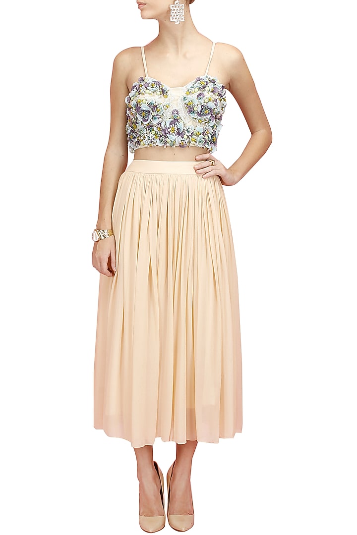 Multicolour floral embroidered bustier with peach flared skirt available only at Pernia's Pop-Up Shop.