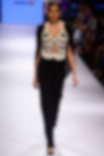 Black and white beadwork cape jumpsuit available only at Pernia's Pop Up Shop.