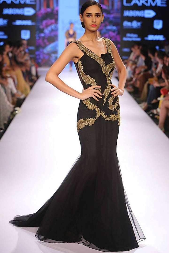 Black and gold serpentine couture gown by Sonaakshi Raaj