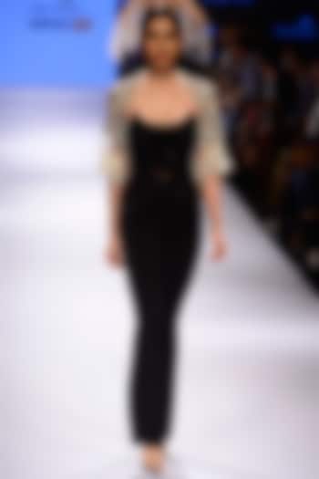 Black embroidered jumpsuit with tassel bolero jacket available only at Pernia's Pop Up Shop.