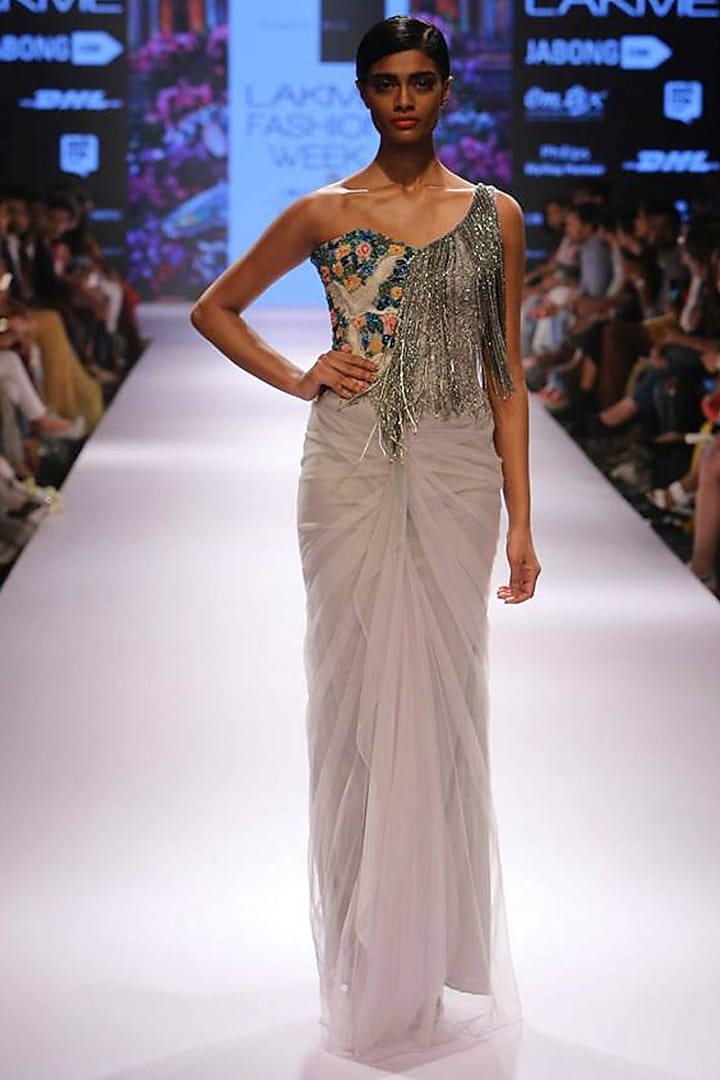 Oyster floral and dove embroidery tassel gown by Sonaakshi Raaj