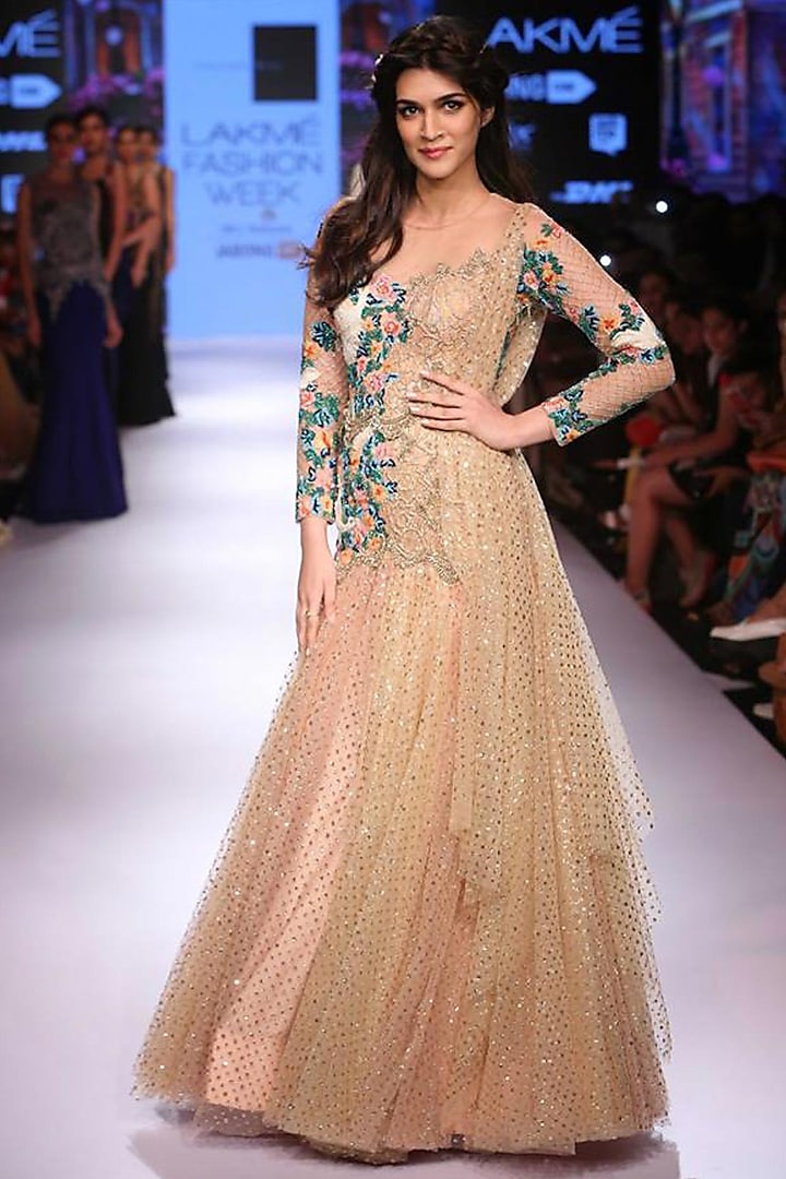 Gold floral and dove embroidery sharara gown by Sonaakshi Raaj