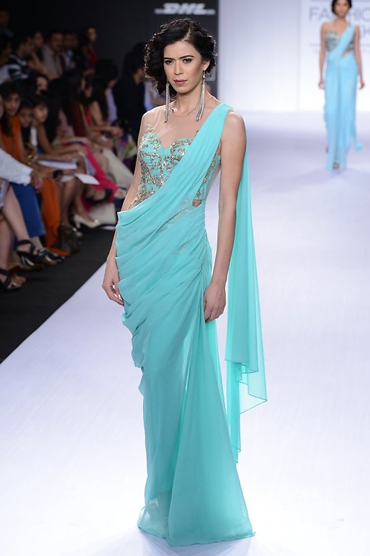 Turquoise embroidered sari-gown by Sonaakshi Raaj