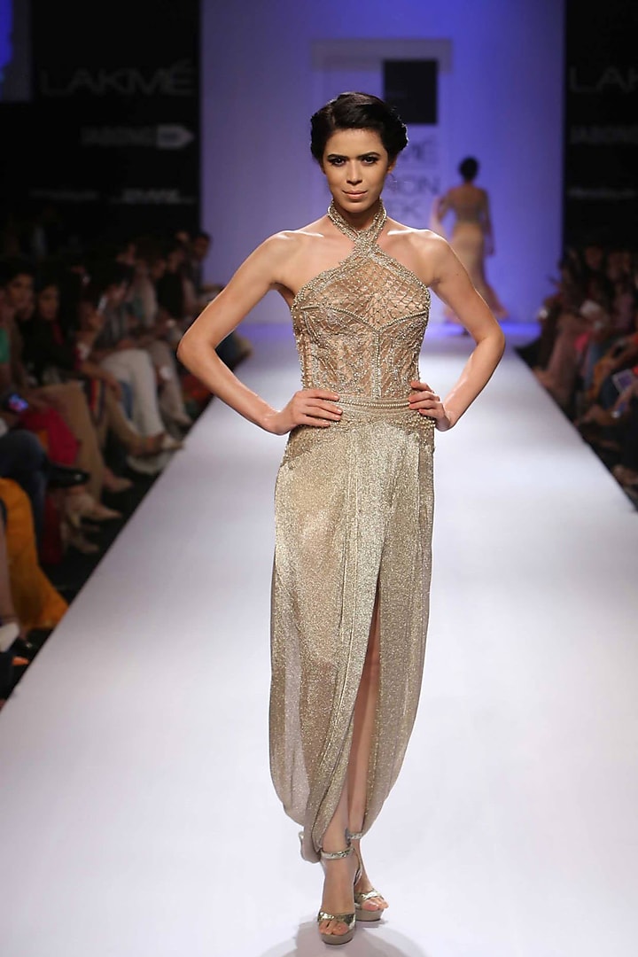 Gold knitted mesh embroidered dhoti gown by Sonaakshi Raaj