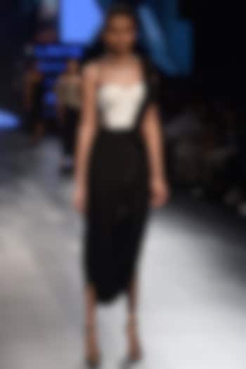 Black ruffled drape gown available only at Pernia's Pop Up Shop.