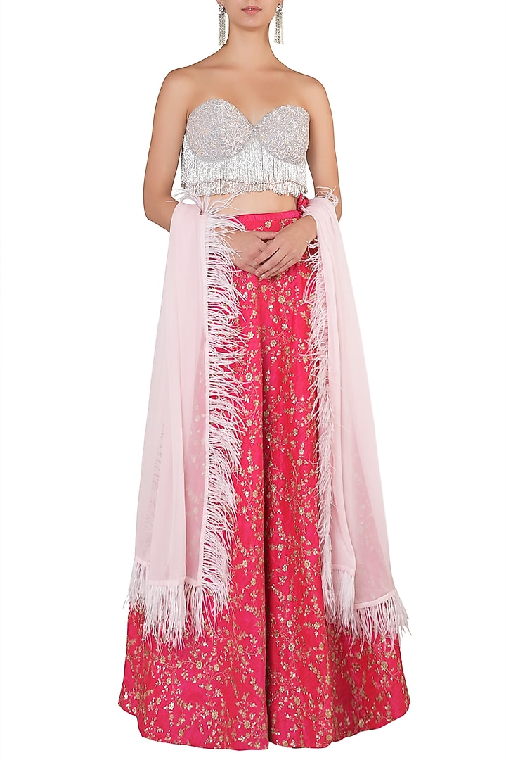 Grey embellished bustier with hot pink lehenga skirt set available only at Pernia's Pop Up Shop.