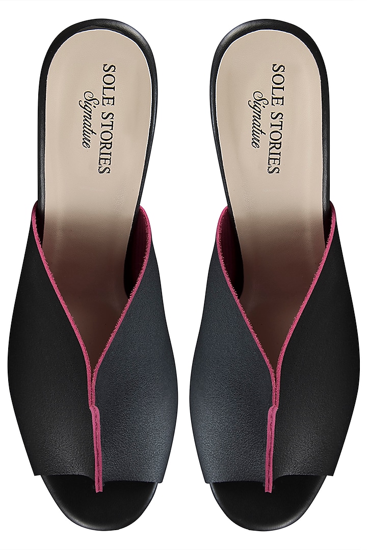 Black with a pink two toned mules by SOLE STORIES