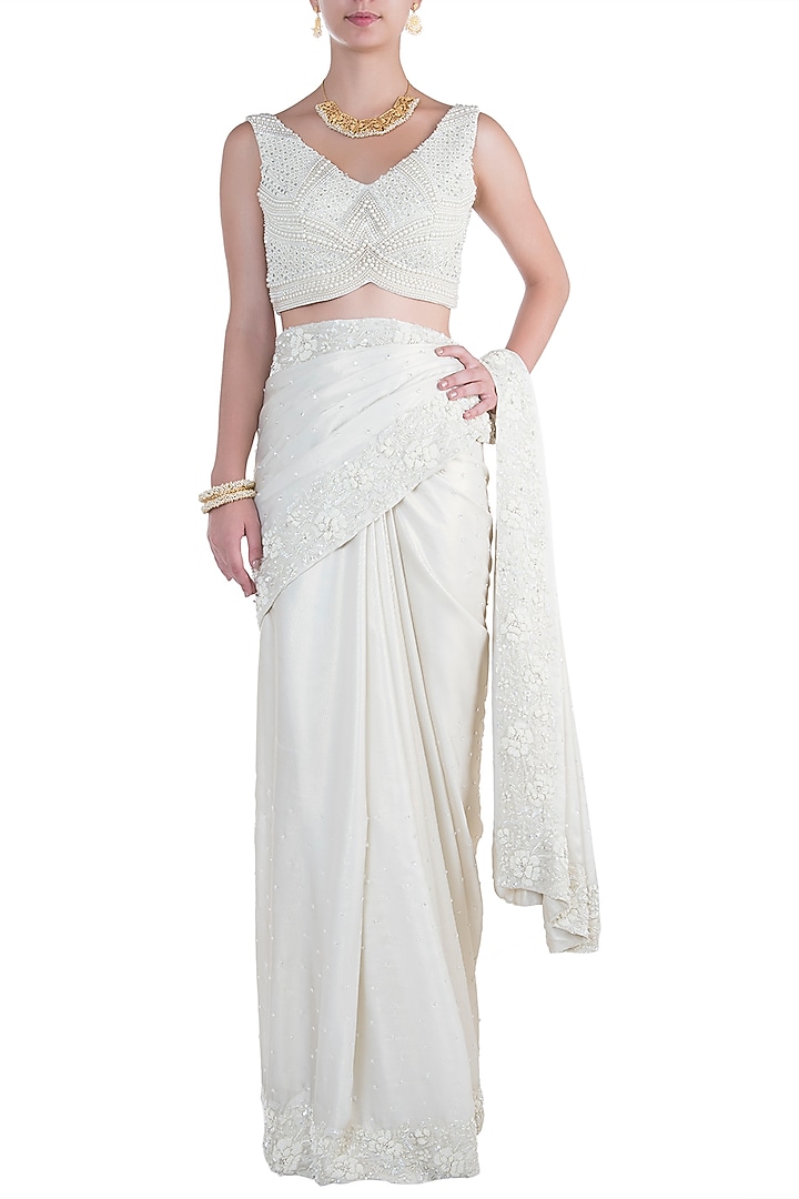 White pearl embroidered saree with blouse available only at Pernia's Pop Up Shop.