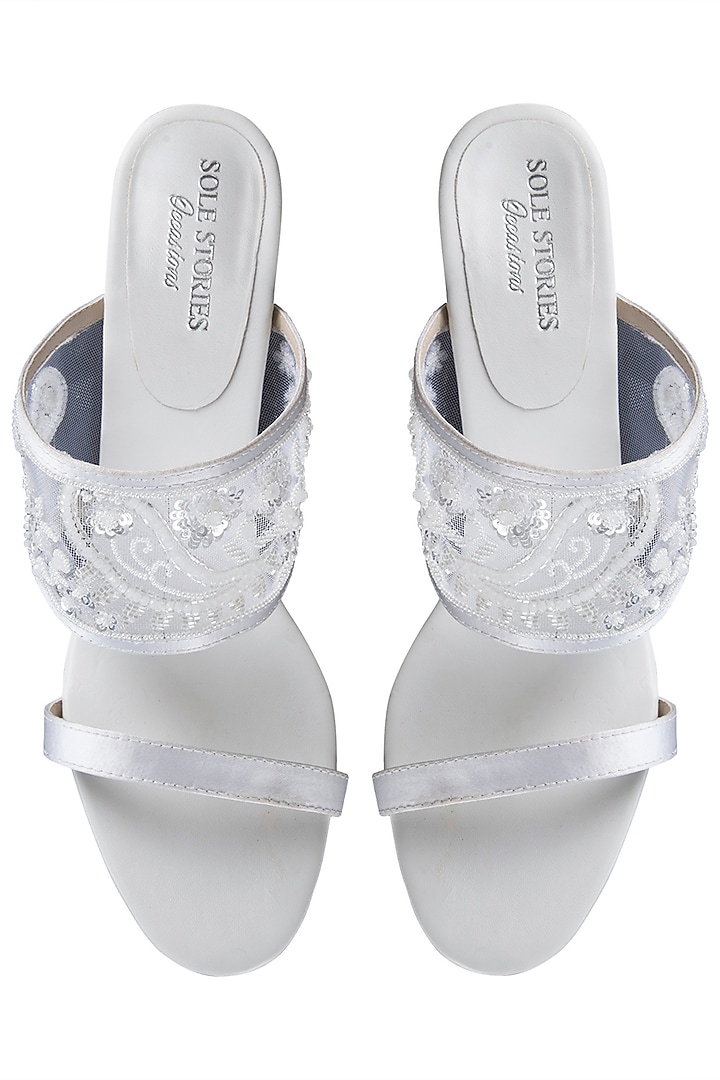 White embroidered block heels available only at Pernia's Pop Up Shop.