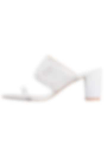 White embroidered block heels by SOLE STORIES