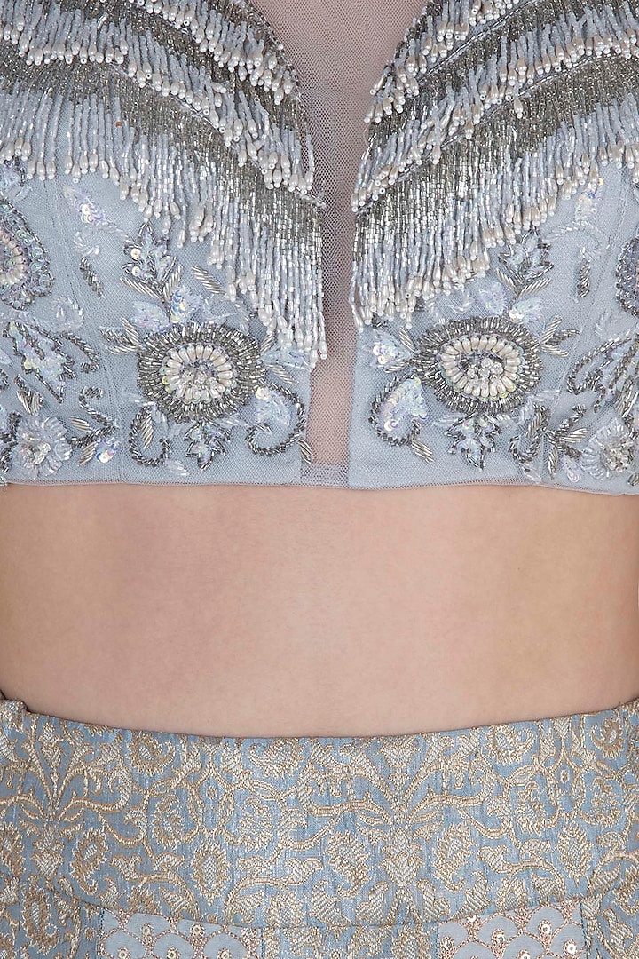 Silver embroidered lehenga set available only at Pernia's Pop Up Shop.