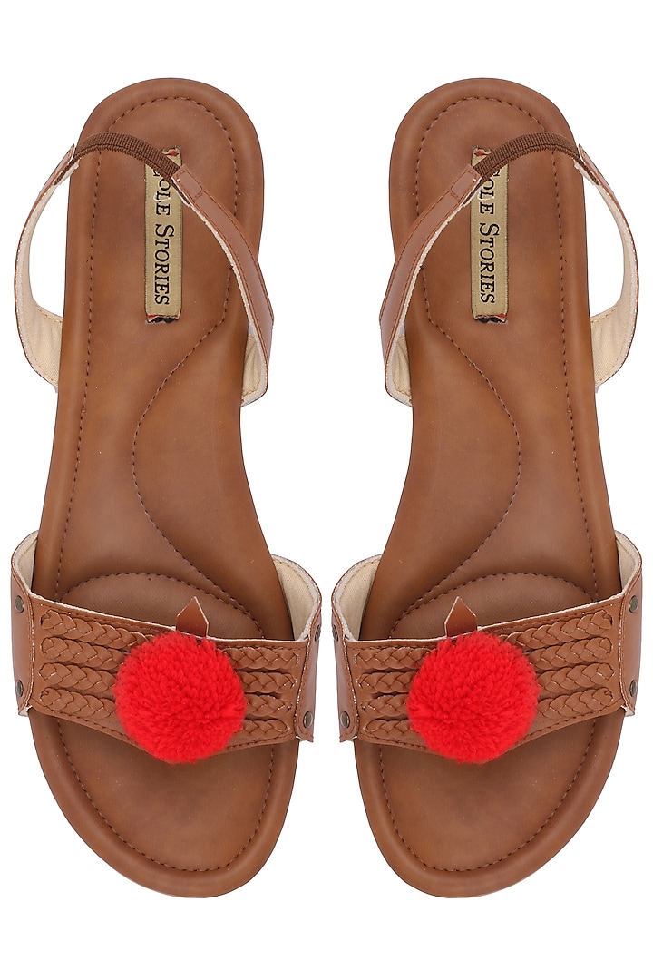 Tan pom pom embellished sandals available only at Pernia's Pop Up Shop.