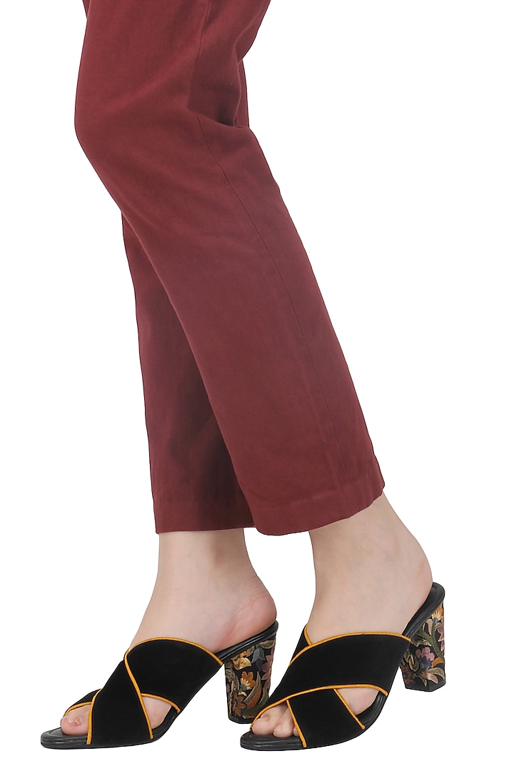 Black and yellow thread embroidered block heels available only at Pernia's Pop Up Shop.