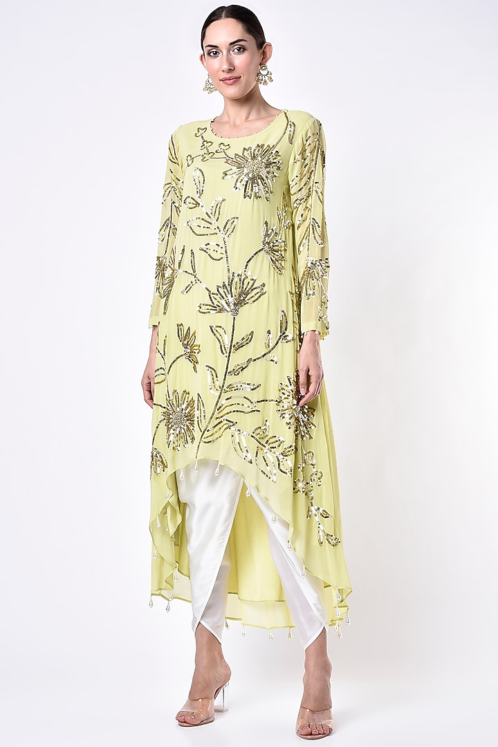 Yellow Embroidered Asymmetrical Kurta Set by Seams Pret & Couture at Pernia's Pop Up Shop