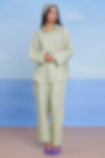 Pista Green Linen Pleated Pants by Saphed at Pernia's Pop Up Shop