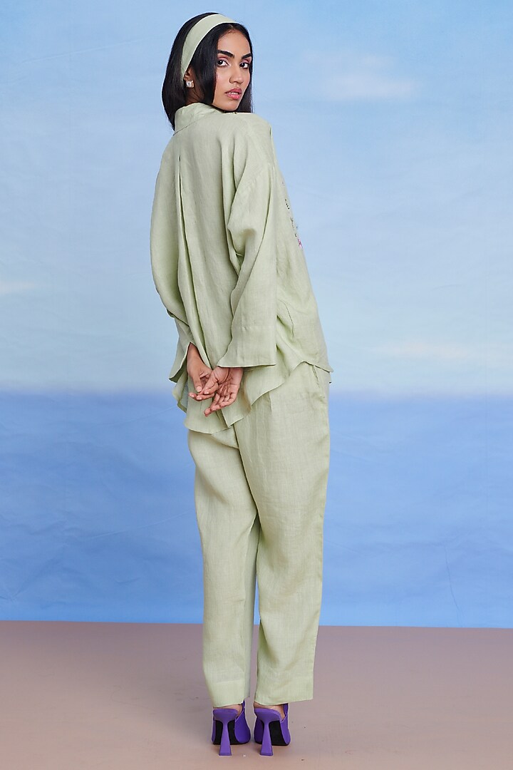 Pista Green Linen Pleated Pants by Saphed at Pernia's Pop Up Shop