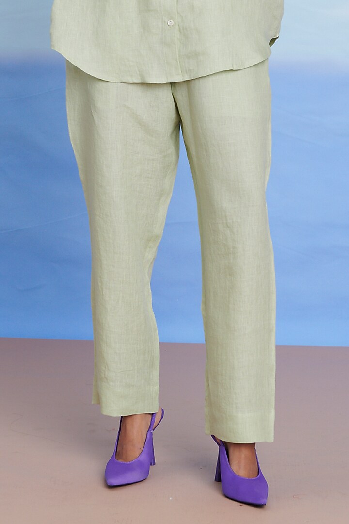 Pista Green Linen Pleated Pants by Saphed at Pernia's Pop Up Shop