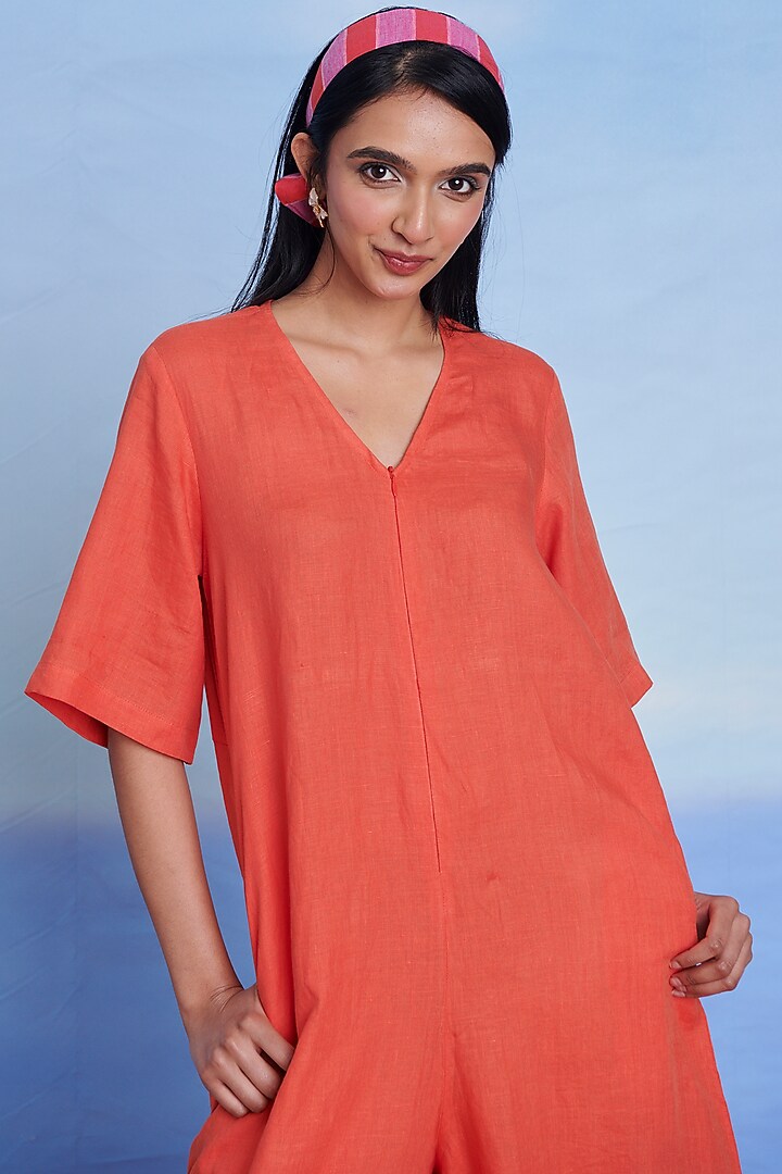 Tangerine Linen Flared Jumpsuit by Saphed at Pernia's Pop Up Shop