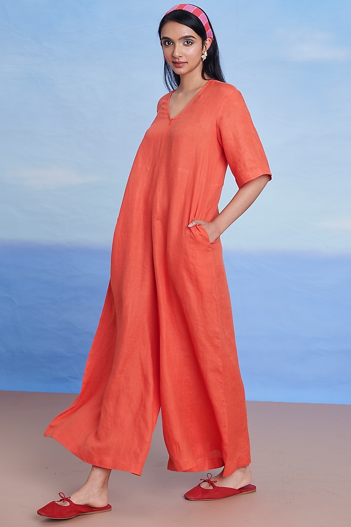 Tangerine Linen Flared Jumpsuit by Saphed at Pernia's Pop Up Shop
