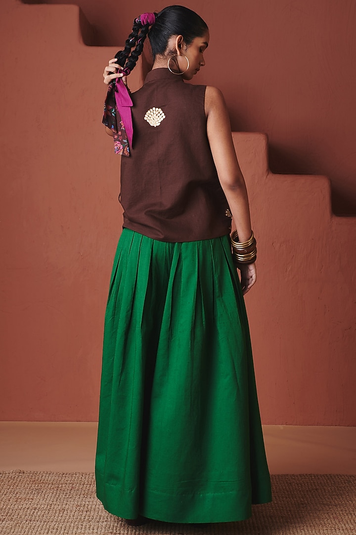 Green Pure Linen Pleated Flared Pants by Saphed at Pernia's Pop Up Shop