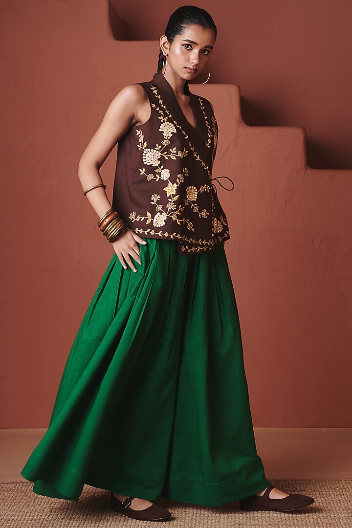 Green Pure Linen Pleated Flared Pants by Saphed at Pernia's Pop Up Shop