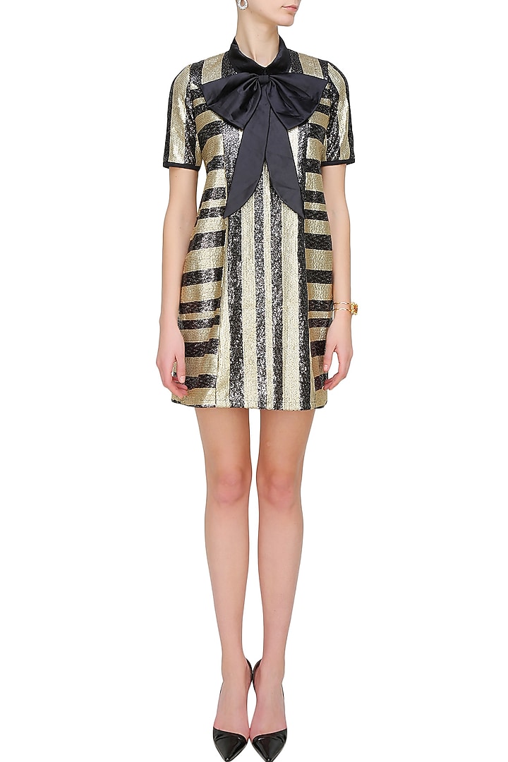 Black and gold striped shift dress with a dramatic bow available only at Pernia's Pop Up Shop.