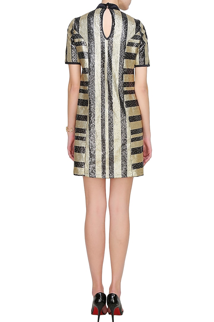 Black and gold striped shift dress with a dramatic bow available only at Pernia's Pop Up Shop.