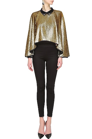 Bold gold sequin cape by Sonam Parmar
