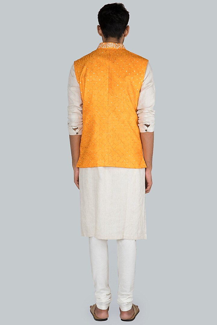 Light Orange Embroidered Bandhani Bundi Jacket by SEIRRA THAKUR at Pernia's Pop Up Shop