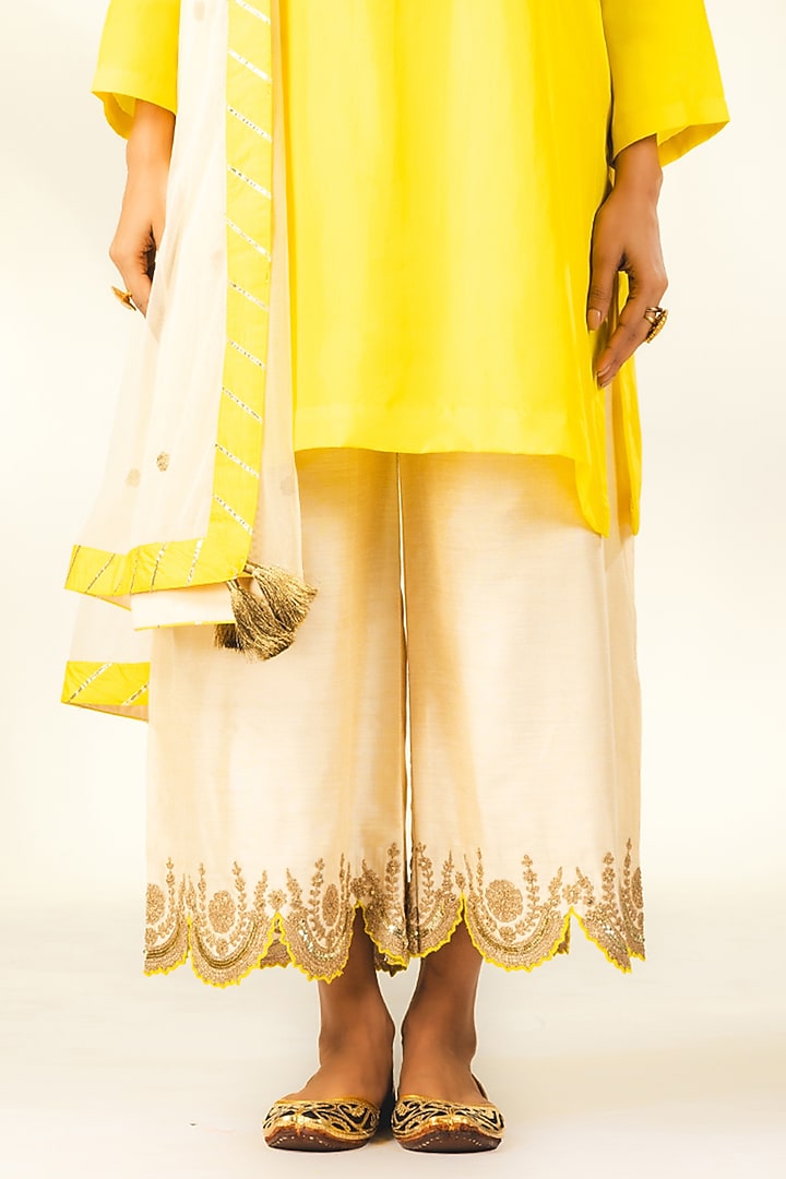 Yellow Crepe Silk Dori & Sequins Embroidered Short Kurta Set by Shivani Sabharwal at Pernia's Pop Up Shop
