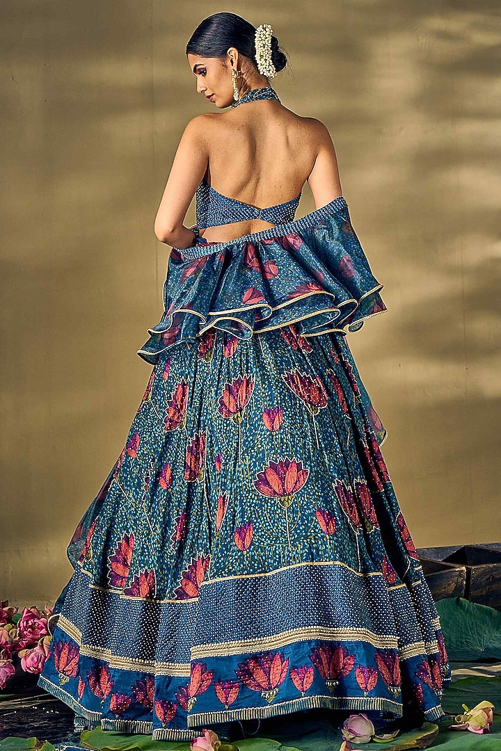 Teal Blue Raw Silk & Liquid Organza Lotus Printed Wedding Lehenga Set by 17:17 at Pernia's Pop Up Shop