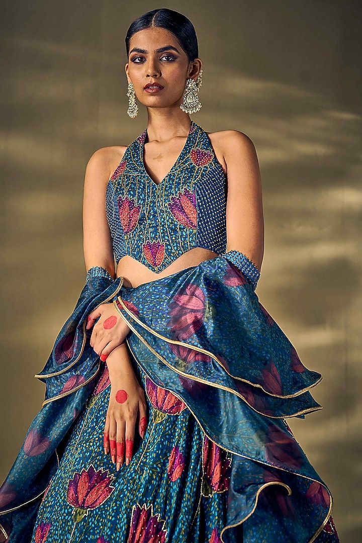 Teal Blue Raw Silk & Liquid Organza Lotus Printed Wedding Lehenga Set by 17:17 at Pernia's Pop Up Shop
