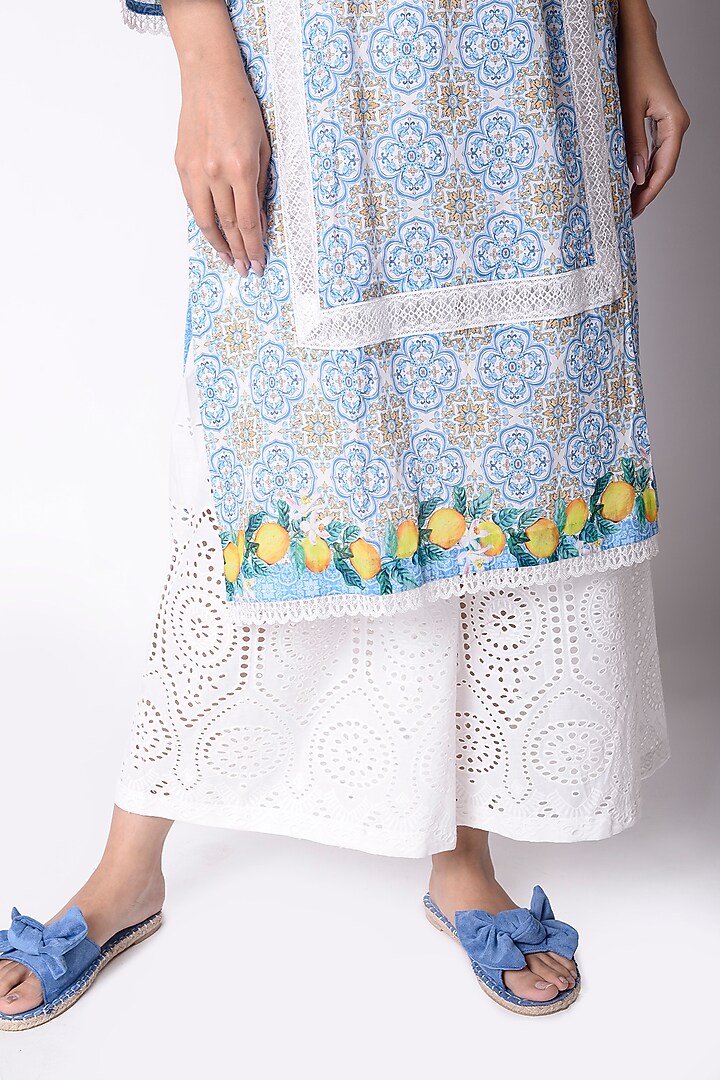 White Palazzo Pants With Cut Work Embroidery by Sage Saga at Pernia's Pop Up Shop